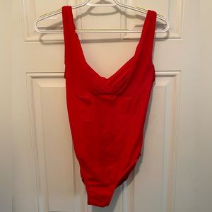 Look 10 lbs. Lighter In 10 Seconds® With Miraclesuit
Swimsuit one piece